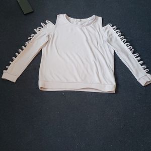 Cold shoulder, loop arm and crew neck sweater